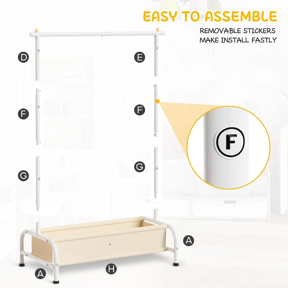 A & M BOUTIQUE white kids clothing rack with a beige storage basket and easy assembly labels for playroom organization.